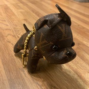 Louis Vuitton plush pup. (While supplies last)